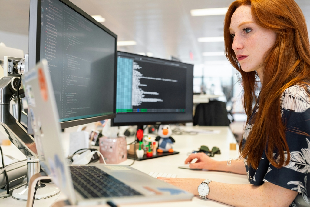 Girl working at a computer. A decorative element