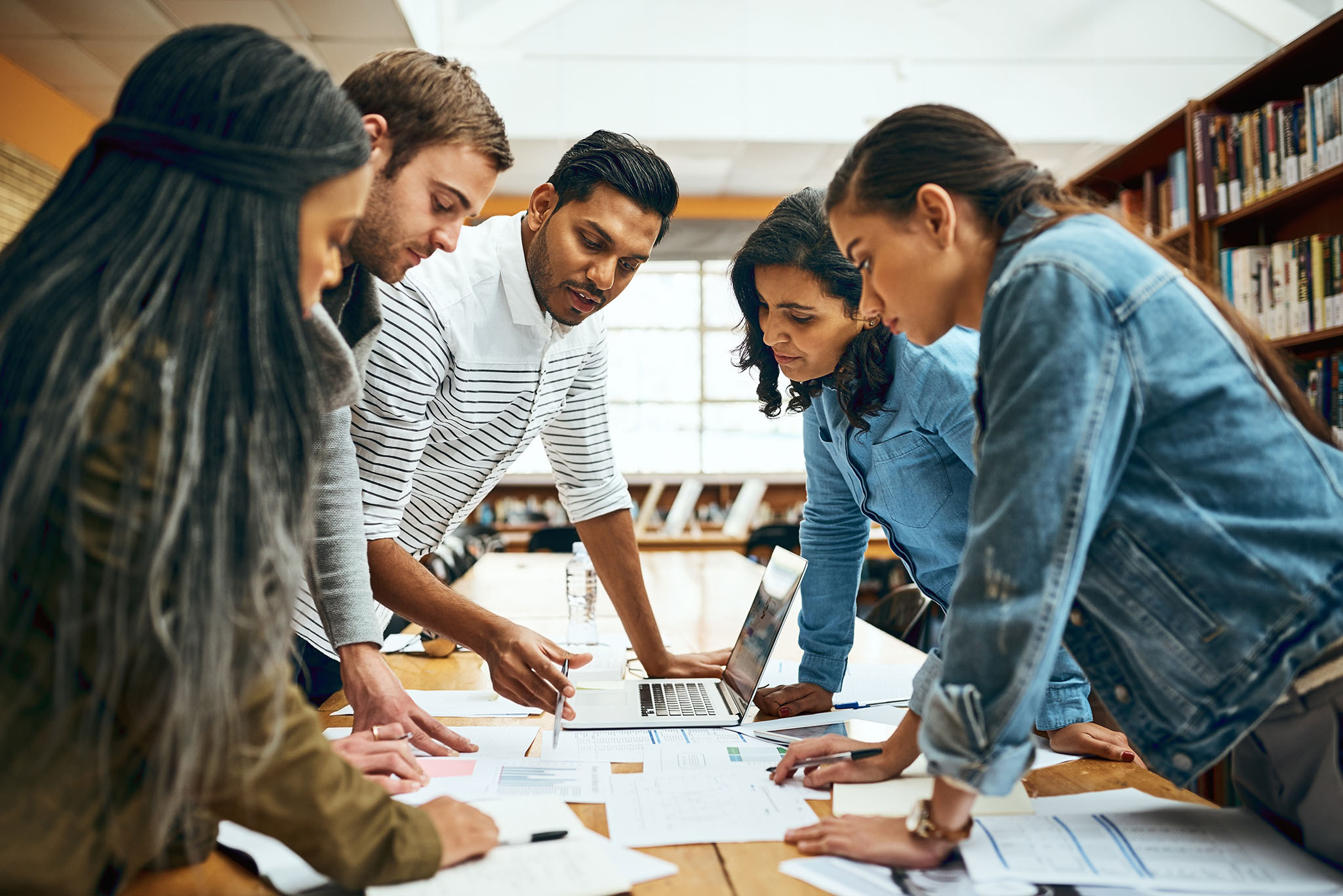 a decorative element: a group of young people at work