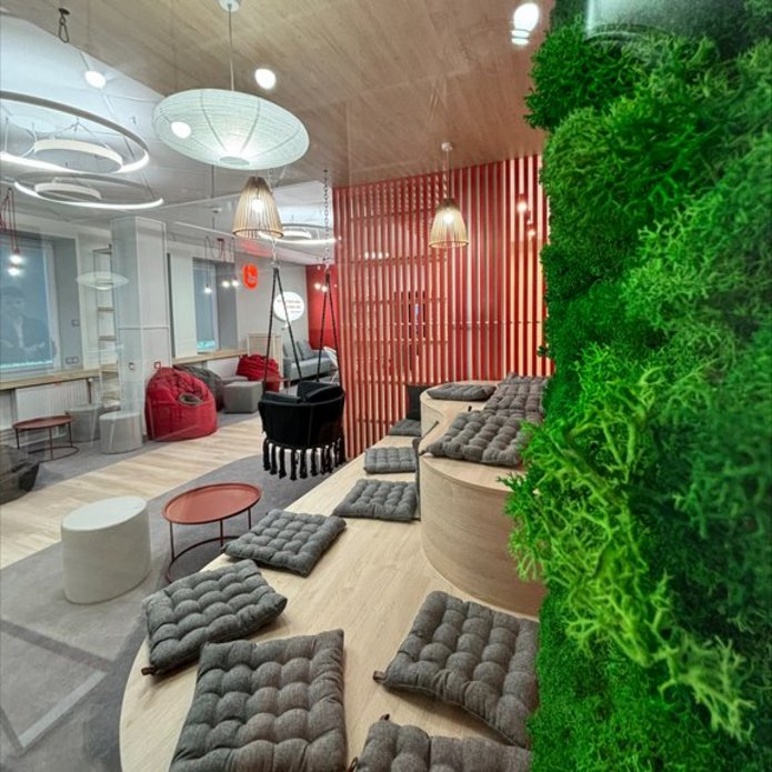 student zone, moss wall, seats, pillows, pouffes