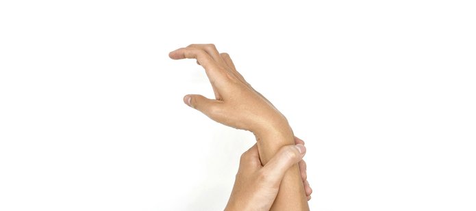 [Translate to English:] Widok dłoni chorego na MPD w nienaturalnym wygięciu