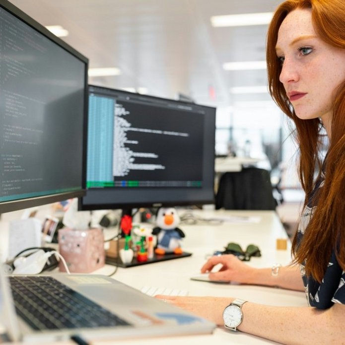 Girl working at a computer. A decorative element