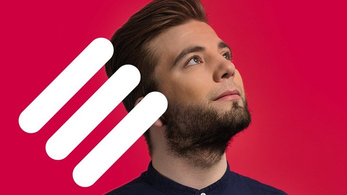 [Translate to English:] Ilustracja do wartości odwaga - mężczyzna na czerewonym tle