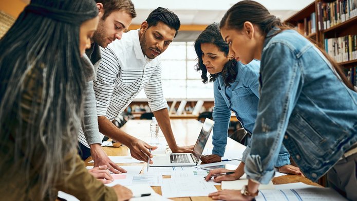 a decorative element: a group of young people at work
