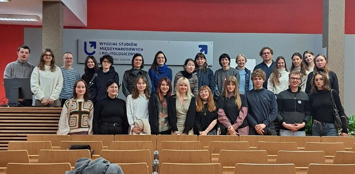 A group photo taken in a lecture hall at the Faculty of International and Political Studies at the University of Lodz